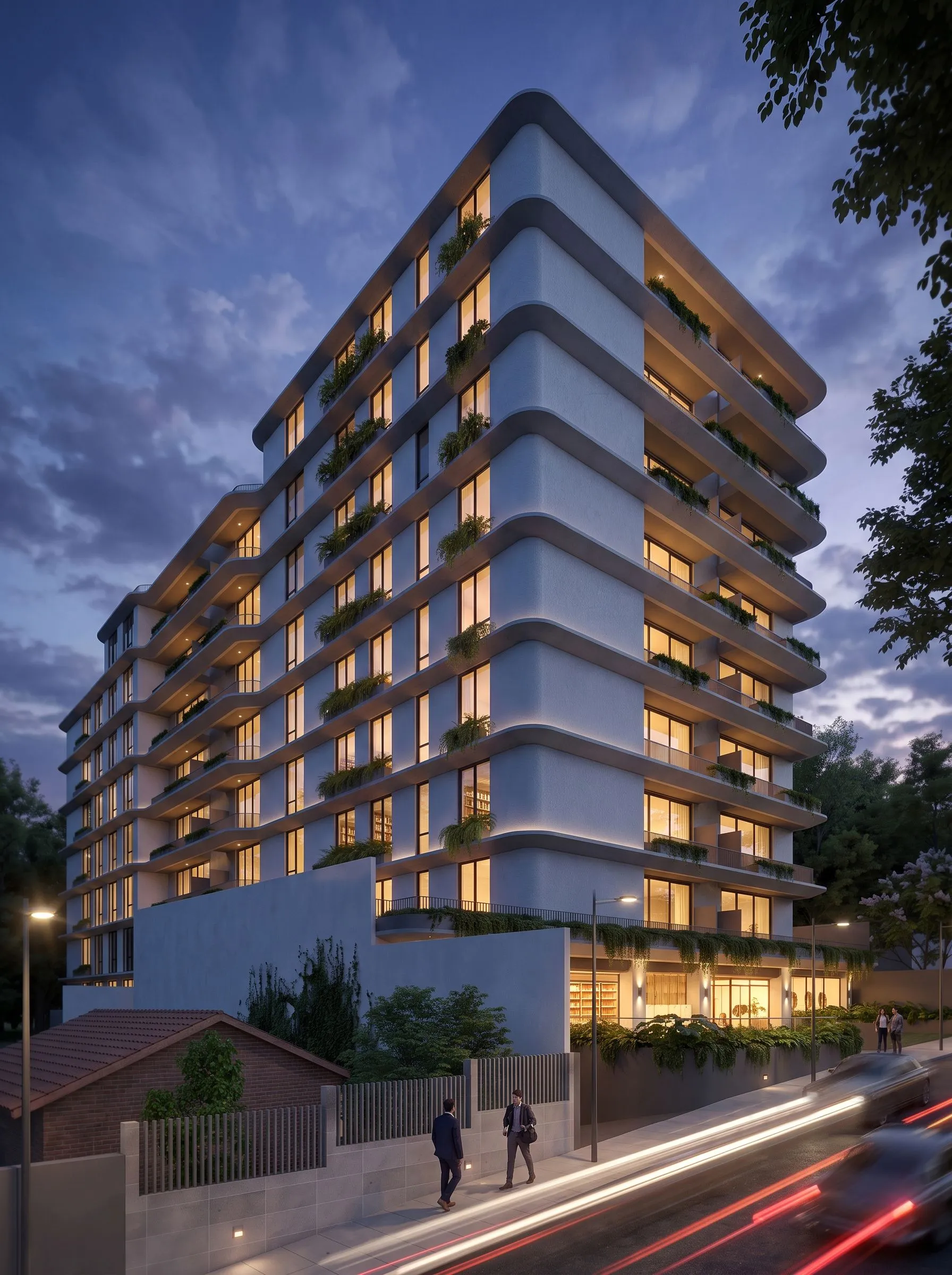LÍF — el edificio de noche, con las viviendas encendidas